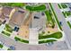 An aerial view of a home with a driveway and sidewalk leading to the front door at 19316 W 84Th Pl, Arvada, CO 80007