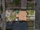 Close aerial view of the property showing lot lines and surrounding landscaping at 1665 S Saint Paul St, Denver, CO 80210