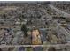 Overhead view of the property and surrounding neighborhood, including a glimpse of the city skyline at 1665 S Saint Paul St, Denver, CO 80210