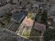 An aerial view showcases the home's layout and highlights its lot size in the neighborhood at 1665 S Saint Paul St, Denver, CO 80210