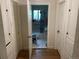 Bathroom features a tub with shower and tiled floor visible through open doorway at 1665 S Saint Paul St, Denver, CO 80210