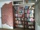 Charming library area featuring built-in shelving and a rustic brick accent wall for character at 1665 S Saint Paul St, Denver, CO 80210