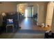 A spacious living room with wood floors, arched doorways, and ample space at 1665 S Saint Paul St, Denver, CO 80210