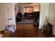 A spacious living room with wood floors, arched doorways, and ample space at 1665 S Saint Paul St, Denver, CO 80210
