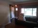 Cozy living room featuring a plush sofa and a large window for natural light at 1665 S Saint Paul St, Denver, CO 80210