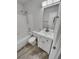 Clean bathroom with white vanity, tub, and shower at 4169 S Lewiston St, Aurora, CO 80013