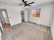 Bright bedroom featuring neutral carpet, ceiling fan and closet at 4169 S Lewiston St, Aurora, CO 80013