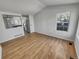 Open concept dining area with hardwood floors and kitchen view at 4169 S Lewiston St, Aurora, CO 80013