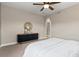 Cozy bedroom featuring plush carpet, neutral tones, and ample space for relaxation at 3773 S Dayton Way, Aurora, CO 80014