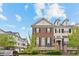 Charming brick townhome with black shutters and manicured landscaping at 3773 S Dayton Way, Aurora, CO 80014