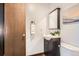 Charming half-bathroom with attractive vanity and decor at 444 Vance St, Lakewood, CO 80226