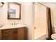 Inviting bathroom featuring a tub with shower at 444 Vance St, Lakewood, CO 80226