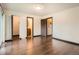 Spacious bedroom with warm wood-look flooring at 444 Vance St, Lakewood, CO 80226