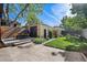 Outdoor space with a deck and seating area, surrounded by landscaping at 756 Steele St, Denver, CO 80206