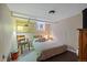 Cozy basement bedroom with ample storage, neutral decor, and natural light at 756 Steele St, Denver, CO 80206