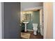 Simple bathroom featuring a pedestal sink and toilet at 756 Steele St, Denver, CO 80206