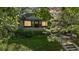 Charming home featuring a well-manicured front yard with lush greenery, landscaping, and inviting curb appeal at 756 Steele St, Denver, CO 80206