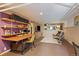 Inviting living room with desk, shelving, and two chairs, perfect for relaxation at 756 Steele St, Denver, CO 80206