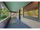 Covered porch with a brick wall at 756 Steele St, Denver, CO 80206