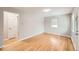 Spacious living room with hardwood floors, lots of natural light, and neutral walls at 970 Lima St, Aurora, CO 80010