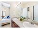 Bright bathroom with double sinks, ample counter space, and a neutral color scheme at 395 Winterthur Way, Highlands Ranch, CO 80129