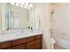 Bathroom features a shower-over-tub with white tile and neutral walls at 395 Winterthur Way, Highlands Ranch, CO 80129