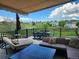 Enjoy the outdoors on this spacious patio with comfortable seating and serene views at 395 Winterthur Way, Highlands Ranch, CO 80129