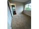 Cozy bedroom with neutral carpet, a window overlooking a yard, and a closet at 9762 Appletree Pl, Thornton, CO 80260