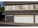 This exterior features a driveway with a three car garage at 9762 Appletree Pl, Thornton, CO 80260