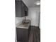 Updated kitchen featuring granite countertops, modern appliances, and stylish cabinetry at 9762 Appletree Pl, Thornton, CO 80260