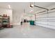 Spacious three car garage with epoxy floors and storage at 1118 Northwood Ln, Castle Rock, CO 80108
