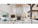 Bright living room showcasing a stone fireplace, built-in cabinets, and large sliding glass doors at 1118 Northwood Ln, Castle Rock, CO 80108
