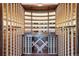 Custom wine cellar with wood racking, display shelves, and space for a growing collection at 1118 Northwood Ln, Castle Rock, CO 80108