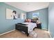 Cozy bedroom with stylish decor, natural light, and comfortable furnishings at 5786 Raleigh Cir, Castle Rock, CO 80104