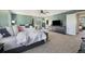 Bright main bedroom with a comfortable bed, large windows, and neutral decor at 5786 Raleigh Cir, Castle Rock, CO 80104