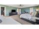 Expansive main bedroom featuring a seating area, large closet, and ensuite bathroom at 5786 Raleigh Cir, Castle Rock, CO 80104