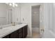 Bathroom with double sinks and a shower-over-tub at 9745 Quay Loop, Westminster, CO 80021