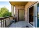 Private balcony with storage and access from the living area at 23376 E 5Th Pl # 101, Aurora, CO 80018