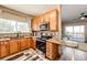 Modern kitchen featuring granite countertops, stainless steel appliances, and ample cabinetry at 23376 E 5Th Pl # 101, Aurora, CO 80018