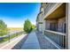 Sidewalk with view of building and open fields at 23376 E 5Th Pl # 101, Aurora, CO 80018