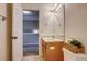 Bathroom with a sink, toilet, and shower/tub combo at 23320 E Berry Ave, Aurora, CO 80016