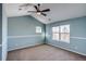 Spacious bedroom with vaulted ceiling, ceiling fan and large window at 23320 E Berry Ave, Aurora, CO 80016