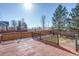 Deck with wooden fence and backyard view at 23320 E Berry Ave, Aurora, CO 80016