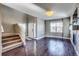 Living room with hardwood floors and plenty of natural light at 23320 E Berry Ave, Aurora, CO 80016