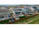 Aerial view of home showcasing the manicured backyard, patio and solar panels at 640 Avena Dr, Elizabeth, CO 80107