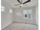 Bright bedroom with large windows, plush carpet, and natural light at 640 Avena Dr, Elizabeth, CO 80107