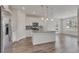 Modern kitchen featuring a center island with pendant lighting and stainless steel appliances at 640 Avena Dr, Elizabeth, CO 80107