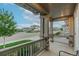 Spacious covered porch, perfect for enjoying the neighborhood views at 640 Avena Dr, Elizabeth, CO 80107