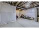 Large unfinished basement with wrapped walls ready for your personal touches at 10992 Xanadu St, Commerce City, CO 80022