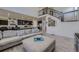 Open-concept living room and kitchen area with modern finishes and a spacious layout at 10992 Xanadu St, Commerce City, CO 80022